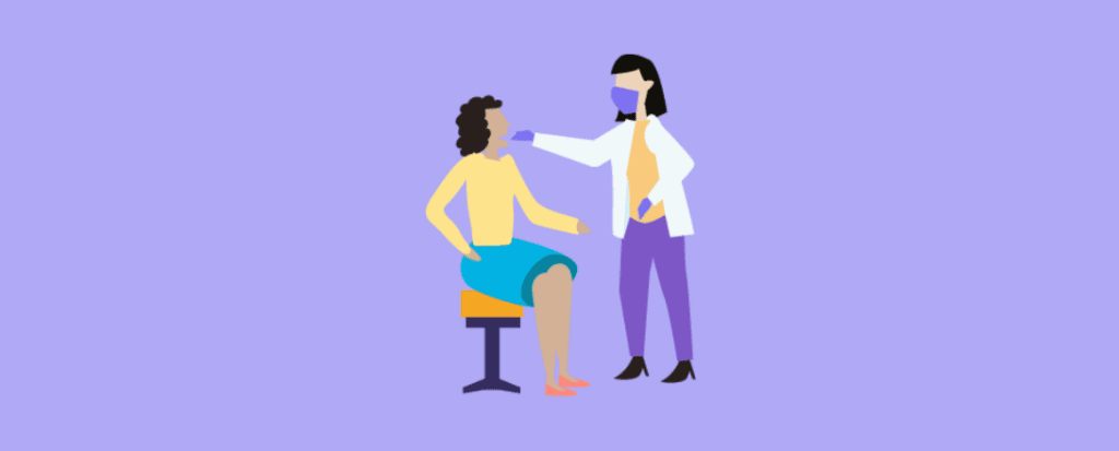 Una persona recibiendo una revisión médica por un doctor